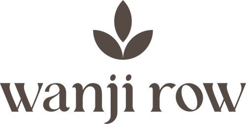 Logo of 'wanji row' with a leaf design above the text on a white background